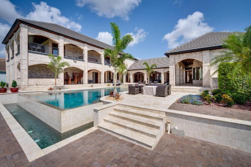 Groveland House | Groveland Home with Pool Luxurious Lakefront Oasis!