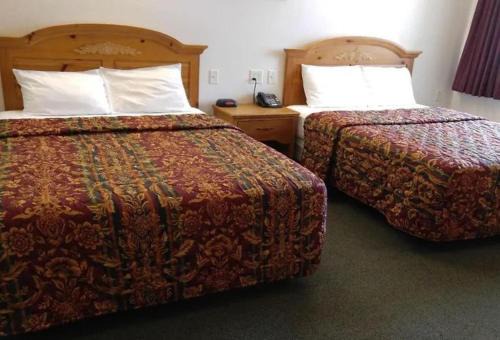 Le Center Hotel | Guardian Inn