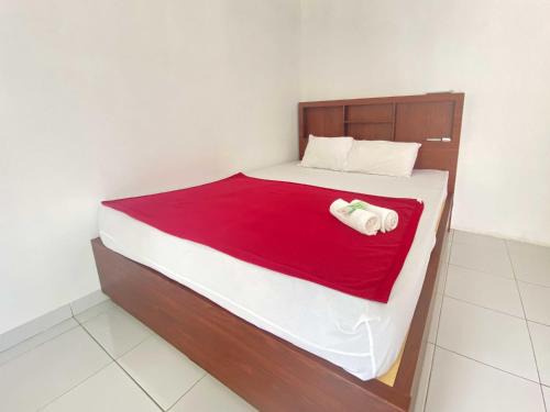 Slawi Hotel | Guest House Hj Muriyah Syariah Slawi Mitra RedDoorz