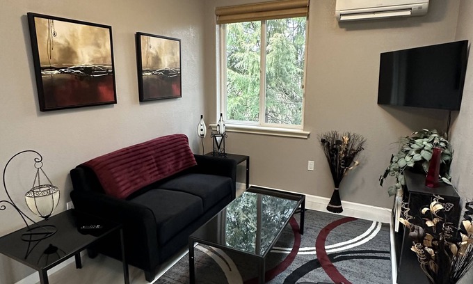 Meadow Glade Cottage | Guest House nestled in the trees with large deck, full kitchen, and laundry