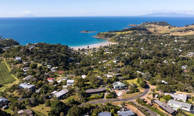 Palm Beach House | Gulf Island Views - Welcome to Gulf Island Views, a beautifully restored premium holiday cottage with incredible views of the Hauraki Gulf. With two bedrooms and one bathroom this is perfect for a family of four or two couples to share.
