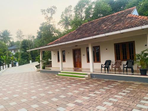 Kaimane House | HappyDays HomeStay Wayanad