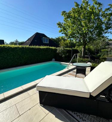 Harrislee House | Haus Bettina, im Garten zuhause
