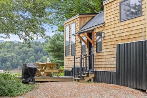 Johnson House | Haven Tiny House w hot tub on river near Stowe