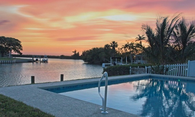 Cocoa Isles House | Heated Pool-Canal-Walk to Beach-Kayaks-Beach Gear