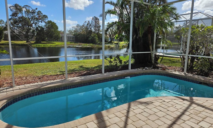 River Pointe House | HEATED Pool! Peaceful Waterfront Home Near Anna Maria!