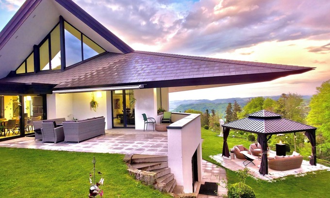 Riggisberg Villa | Hilltop Luxury Villa with Minigolf, Indoor Pool, Wellness & Spa