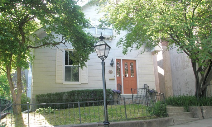 Burlington House | Historic home ideally located on famed Snake Alley, a one of a kind location.