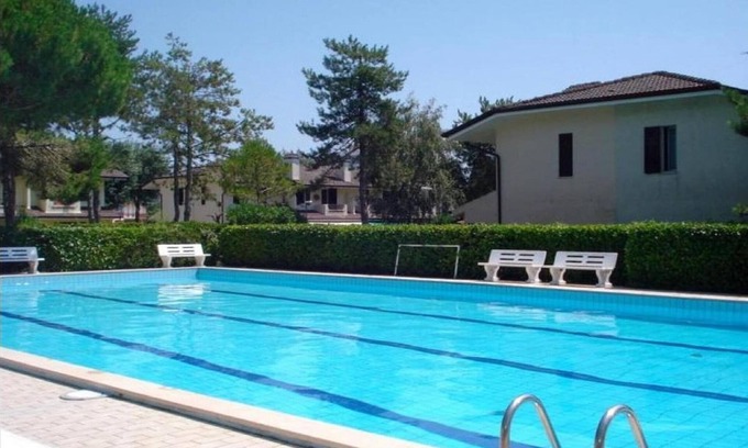 Porto Santa Margherita Villa | Holiday Home in Porto Santa Margherita by Beach
