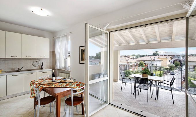 Desenzano del Garda Apartment | Holiday Apartment 'Katy Lake Menta' with Lake View, Pool & Wi-Fi