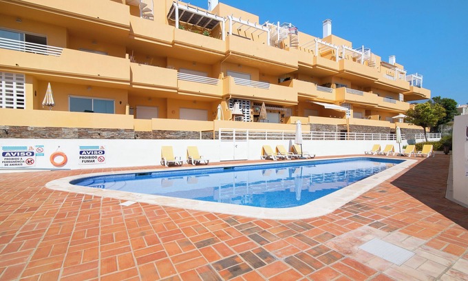 Canada Apartment | Holiday Apartment "Royal Cabanas Golf 87" with Sea View, Shared Pool & Private Terrace