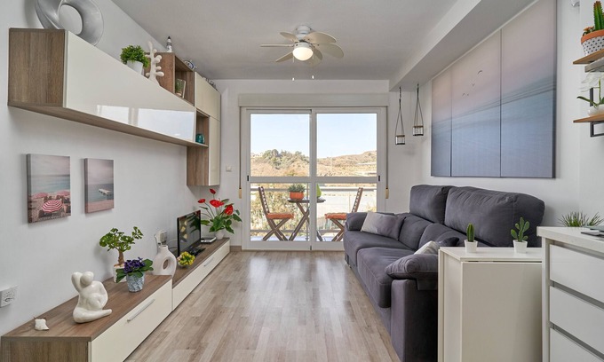 Rio Velez Apartment | Holiday Apartment 'Abierto Al Mar' with Sea View, Shared Pool & Wi-Fi
