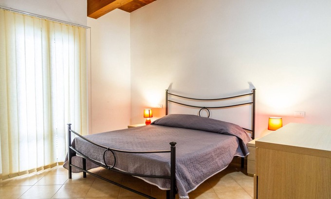 Follonica Apartment | Holiday Apartment 'Aria' close to the Beach with Shared Terrace & Balcony