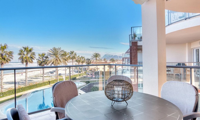 Almadrava Beach Apartment | Holiday Apartment "Beverly Primera Linea De Palya" with Sea View, Shared Pool & Wi-Fi
