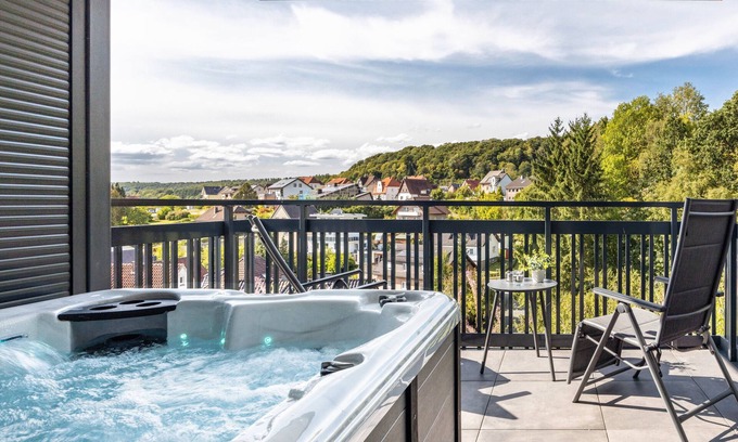 Altenbeken Apartment | Holiday Apartment "Egge Resort 7d" with Balcony, Whirlpool and Sauna with Viaduct View