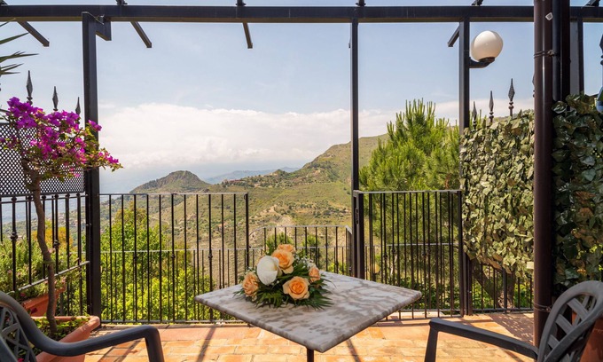 Castelmola Apartment | Holiday Apartment 'Garden Cottage I Dammusi - Limoni' with Mountain View, Shared Pool & Wi-Fi