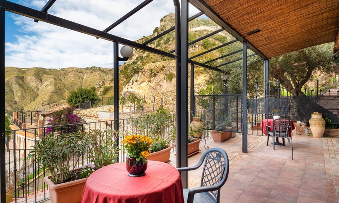 Castelmola Apartment | Holiday Apartment 'Garden Cottage I Dammusi - Ulivo' with Mountain View, Shared Pool & Wi-Fi