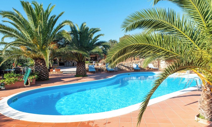 Telti Apartment | Holiday Apartment "Villa Smeralda" with Italian Atmosphere and Shared Pool