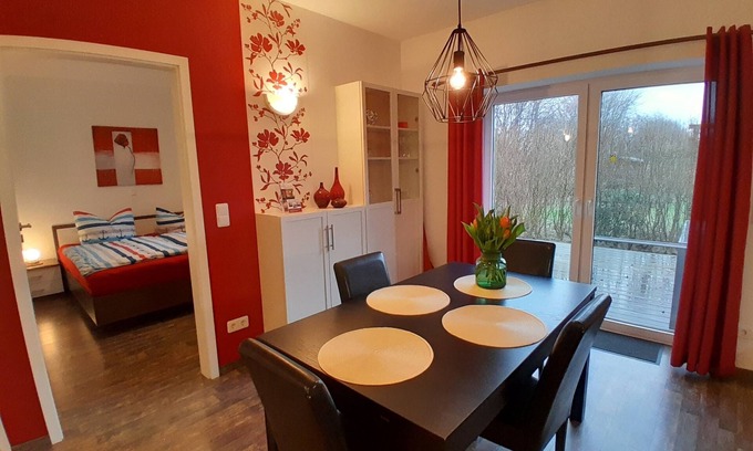 Langballig Apartment | Holiday Apartment "Wikingerland Typ 1 Erdgeschoss" with Private Terrace, Shared Garden & Wi-Fi