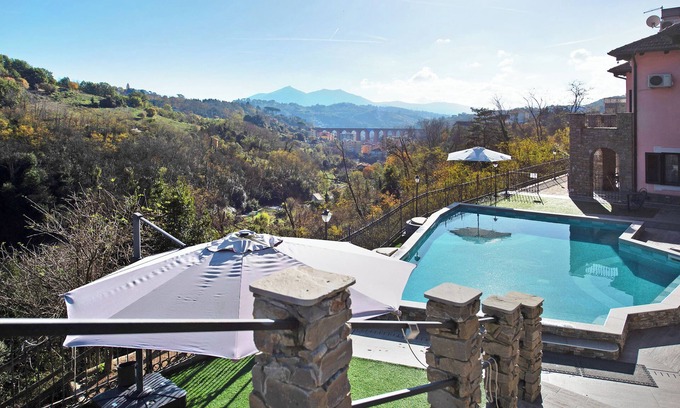 Campomorone House | Holiday Home "Baia Di Campo" with Shared Pool, Private Garden and Wi-Fi