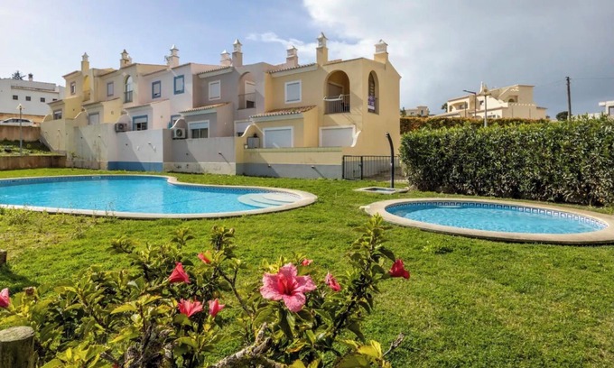 Lagos House | Holiday Home 'Casa Cláudia - Cond Atalaia' with Shared Pool, Private Terrace and Wi-Fi