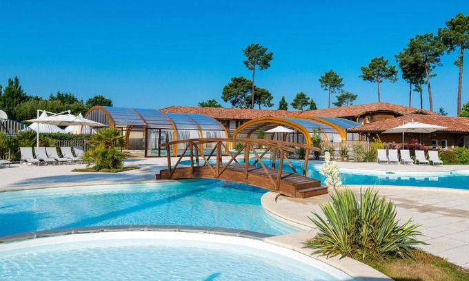 Parentis-en-Born House | Holiday Home Les Cottages du Lac - PNS214 by Interhome