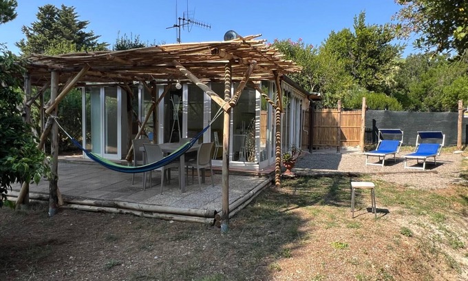 Lacona House | Holiday Home 'Limone' with Private Terrace, Private Garden and Air Conditioning