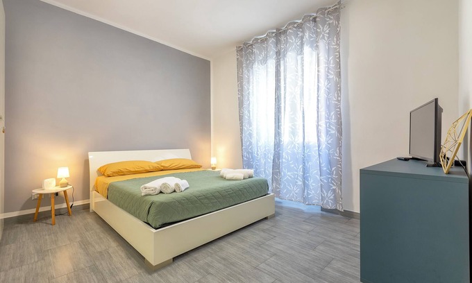 Porto Torres House | Holiday Home 'Oikos 58' with Private Terrace, Wi-Fi and Air Conditioning