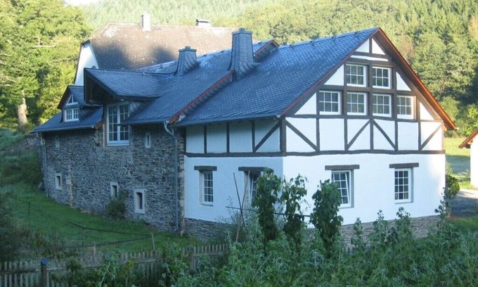 Beuren House | Holiday home old mill with wooden mill wheel