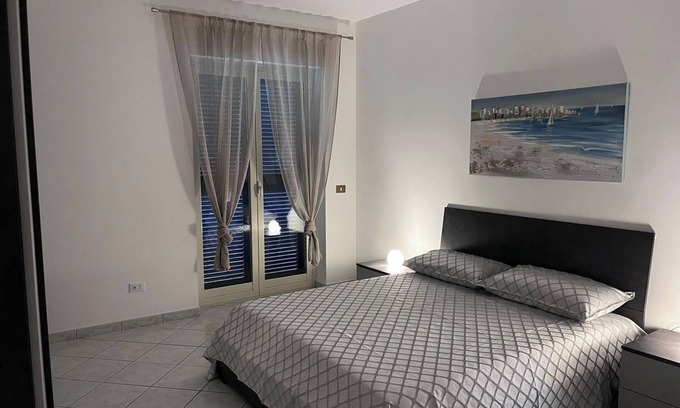 Isola Sacra House | Holiday Home 'Titina's House' with Balcony, Wi-Fi and Air Conditioning