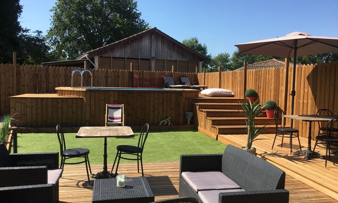 Pontenx-les-Forges House | Holiday house MIMIZAN, Very warm wooden terrace, private swimming pool.