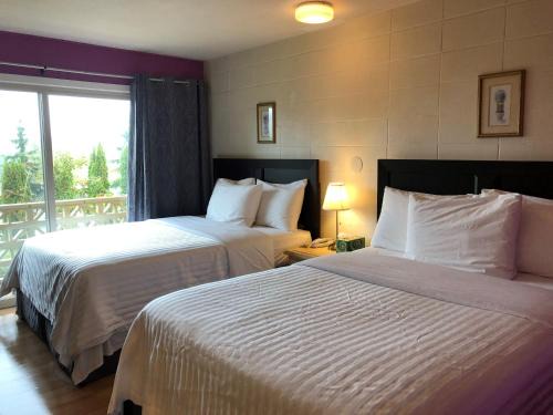 Heritage Downtown Hotel | Holiday House Motel