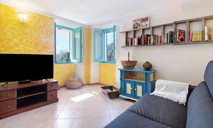 San Colombano Certenoli Apartment | Holiday Apartment 'La Fermenteria' with Mountain View, Shared Garden & Wi-Fi