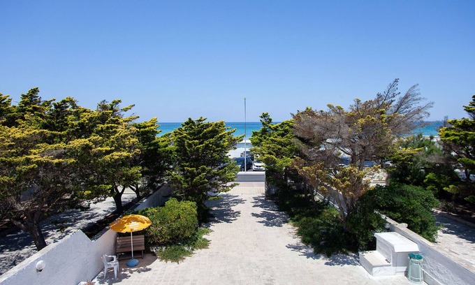 Torre Chianca Ski Chalet | Holiday villa with large courtyard in front of the beach 3 bedrooms m730