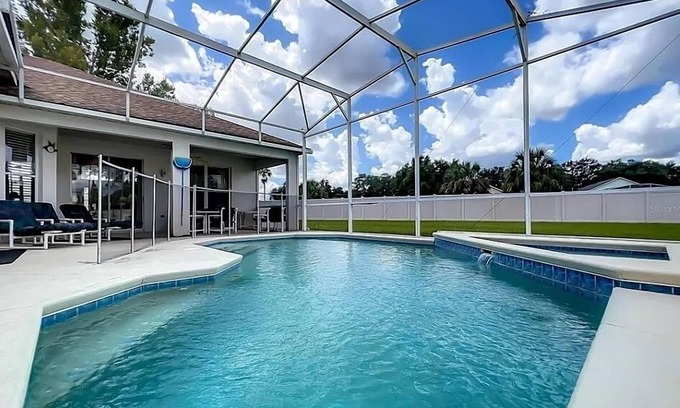 Westridge House | Home near Disney/golf with screened pool, spa, pool table, foosball, AC, & W/D