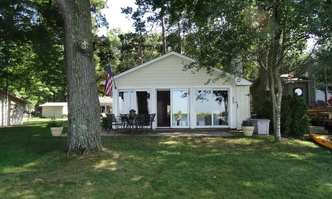 Mears Cottage | Home on the lake. Walk out your door for Swimming, boating or morning coffee.