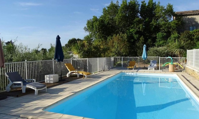Cardet House | Homerez - Nice house for 4 ppl. with shared pool, garden and terrace at Cardet