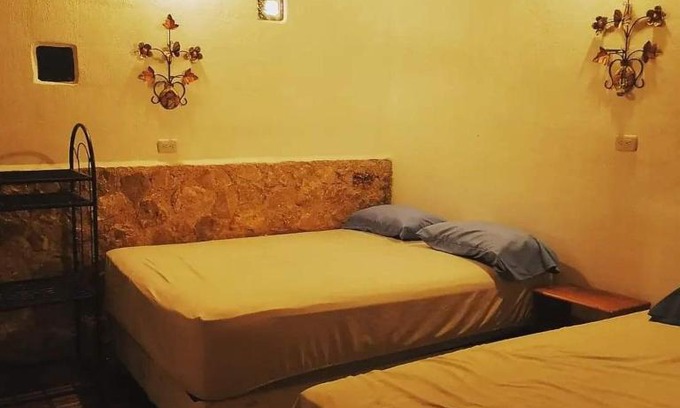 Flores Hotel | Hotel Colibrí Petén