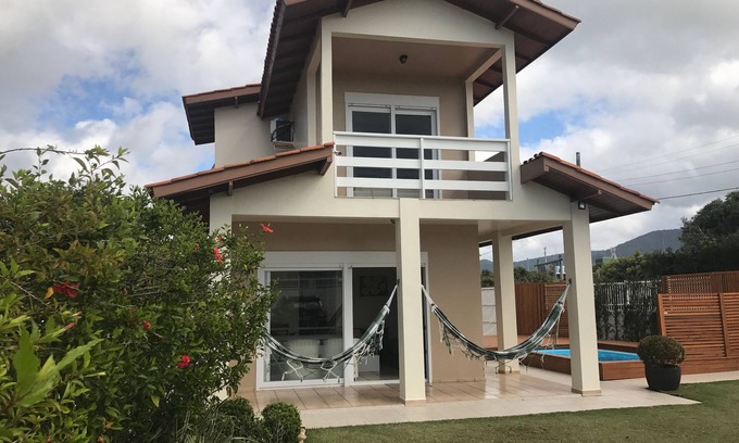 Barra da Lagoa House | House Front Sea 30 m. from the beach, Swimming pool, 4 Air cond. 4 full baths