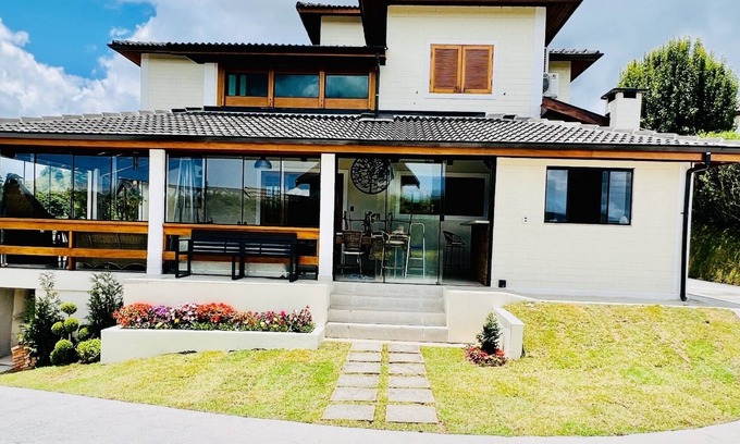 Campos do Jordao Cottage | House in Gated Community with Heated Pool, Hydro, Jacuzzi and Beautiful View.