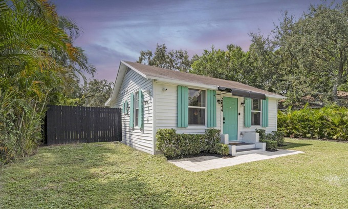 Westgate House | House with Fenced Yard - Palm Wave Says -