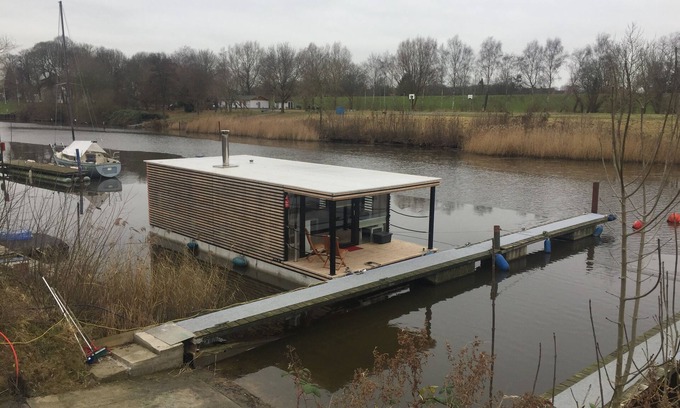Rustersiel Boat Rental | Houseboat HT 4; with fireplace for 4 people in an idyllic location in Wilhelmshaven