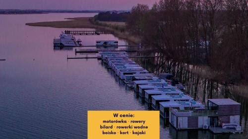 Mielno Apartment | HT Houseboats - domki na wodzie - sauna, motorówka, rowerki wodne