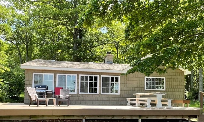 Spruce Cottage | Hubbard Lake Sunset Hideaway, large lakefront property.