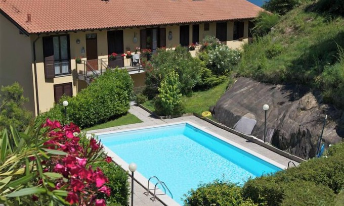 Maccagno con Pino e Veddasca Apartment | Tastefully furnished 1-bedroom apartment in a nice residence with swimming pool