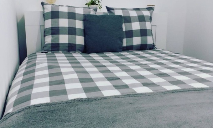 Jullouville Apartment | Jullouville - Full center - 50m from the sea - apartment - small garden