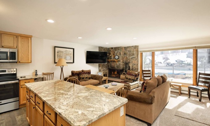 Snowmass Village Condo | Just Steps to Outdoor Pool/Hot Tub! Patio with Grill, Wood Fireplace & Covered Parking