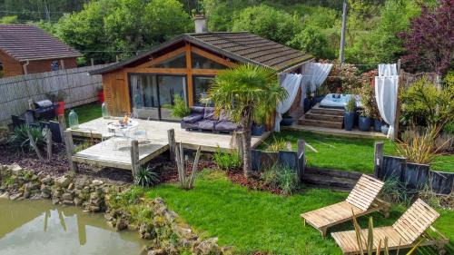 Muizon House | KÄBANE 85, Lodge avec spa au bord de l'eau