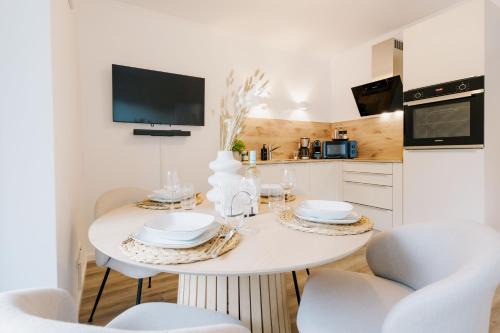 Greetsiel Apartment | Küsten Suite de See - Suite 1 direkte Deichlage, Terrasse, 53qm