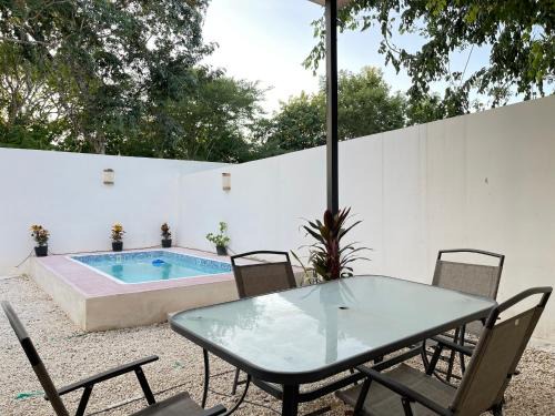 Merida House | Kaab: Exclusividad y confort en un oasis vacacional con piscina